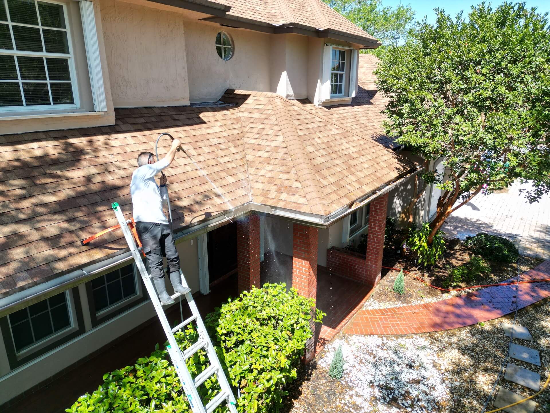 Professional gutter cleaning service in Destin FL - removing debris and buildup